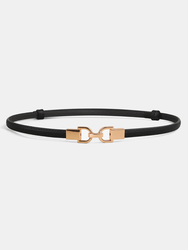 Adjustable leather belt with a metal buckle