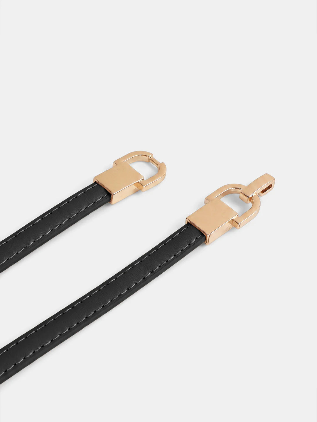 Adjustable leather belt with a metal buckle